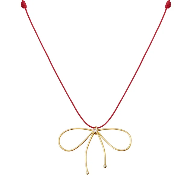 Aimée Aimer Nœud de Paris collier or jaune diamants bleu marine