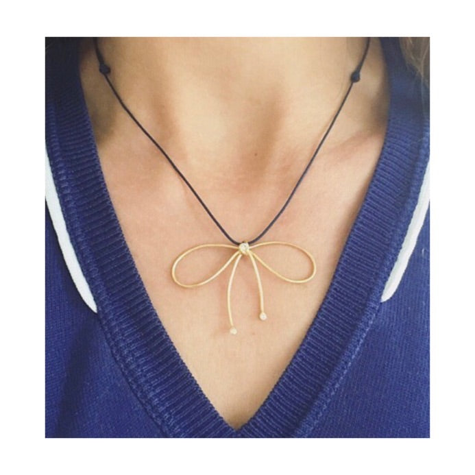 Aimée Aimer Nœud de Paris collier or jaune diamants bleu marine