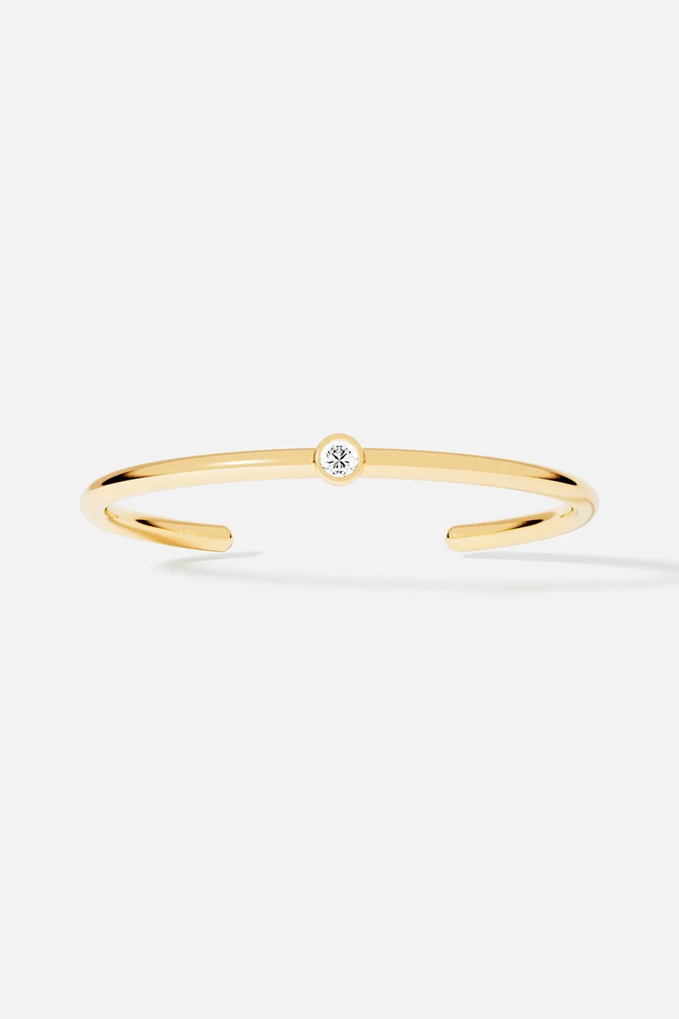 APM Monaco Soleil Éclat manchette dorée zircons