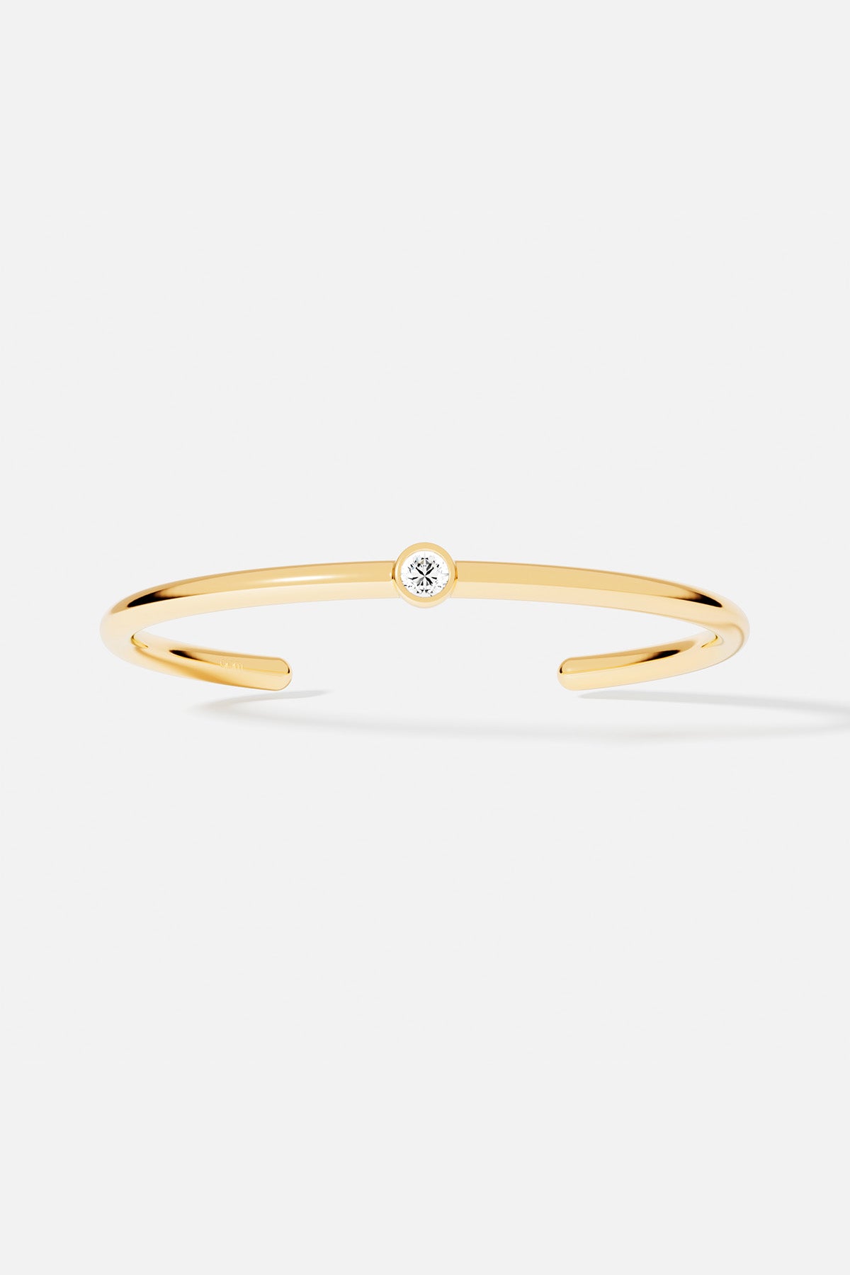 APM Monaco Soleil Éclat manchette dorée zircons
