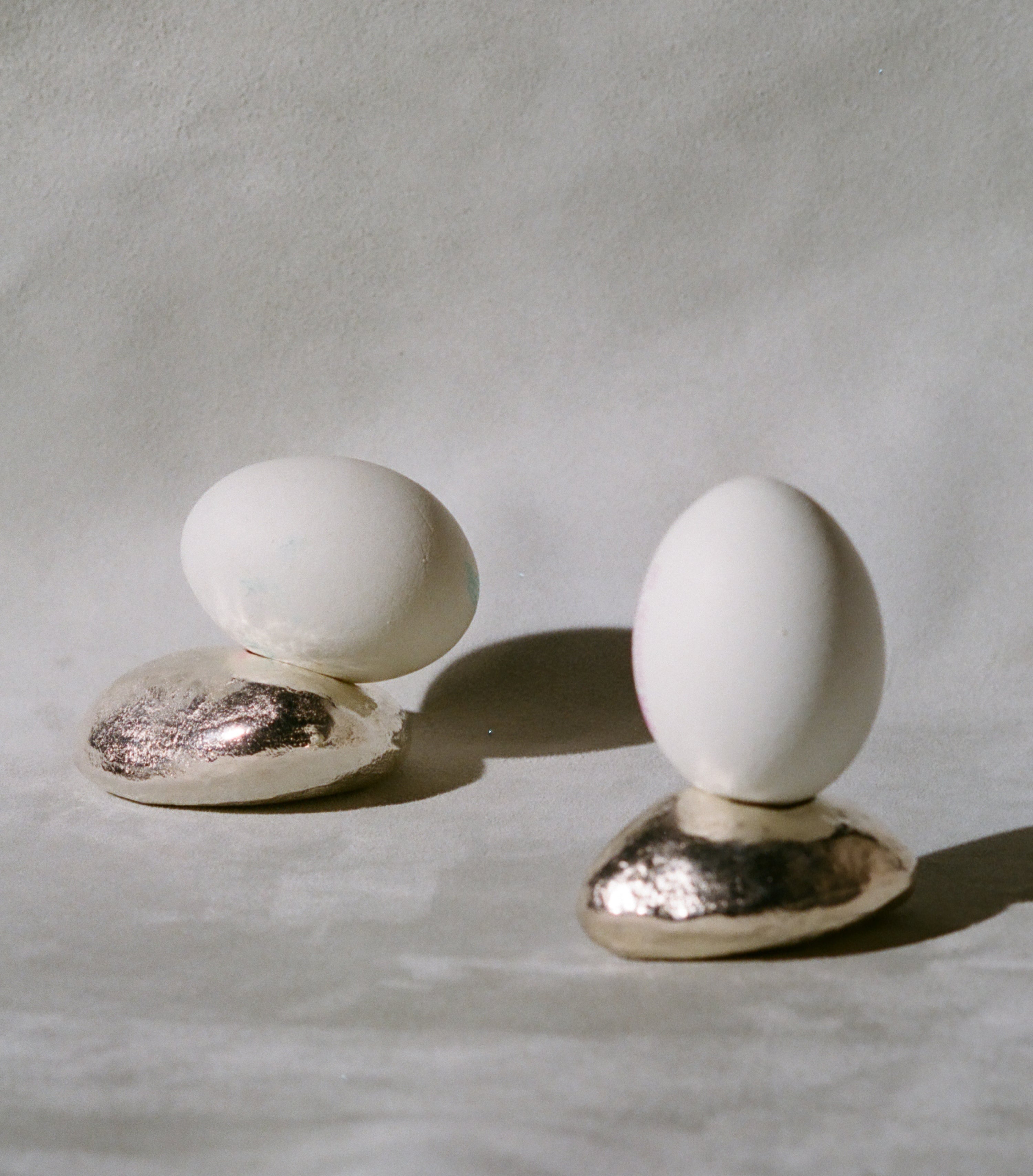 Alighieri Floating Pebble bougeoirs argentés galet