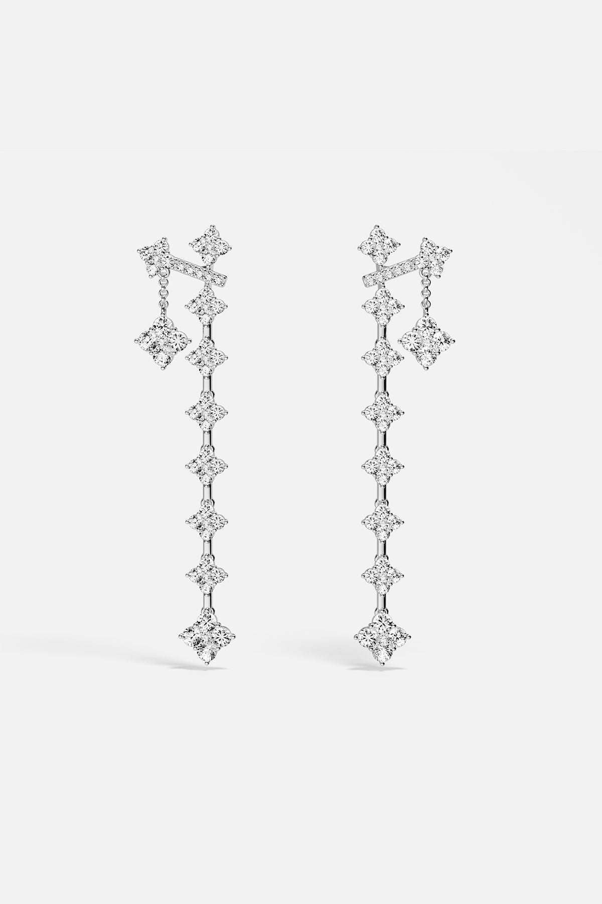 APM Monaco Lumière Éclat boucles d'oreilles pendantes blanches