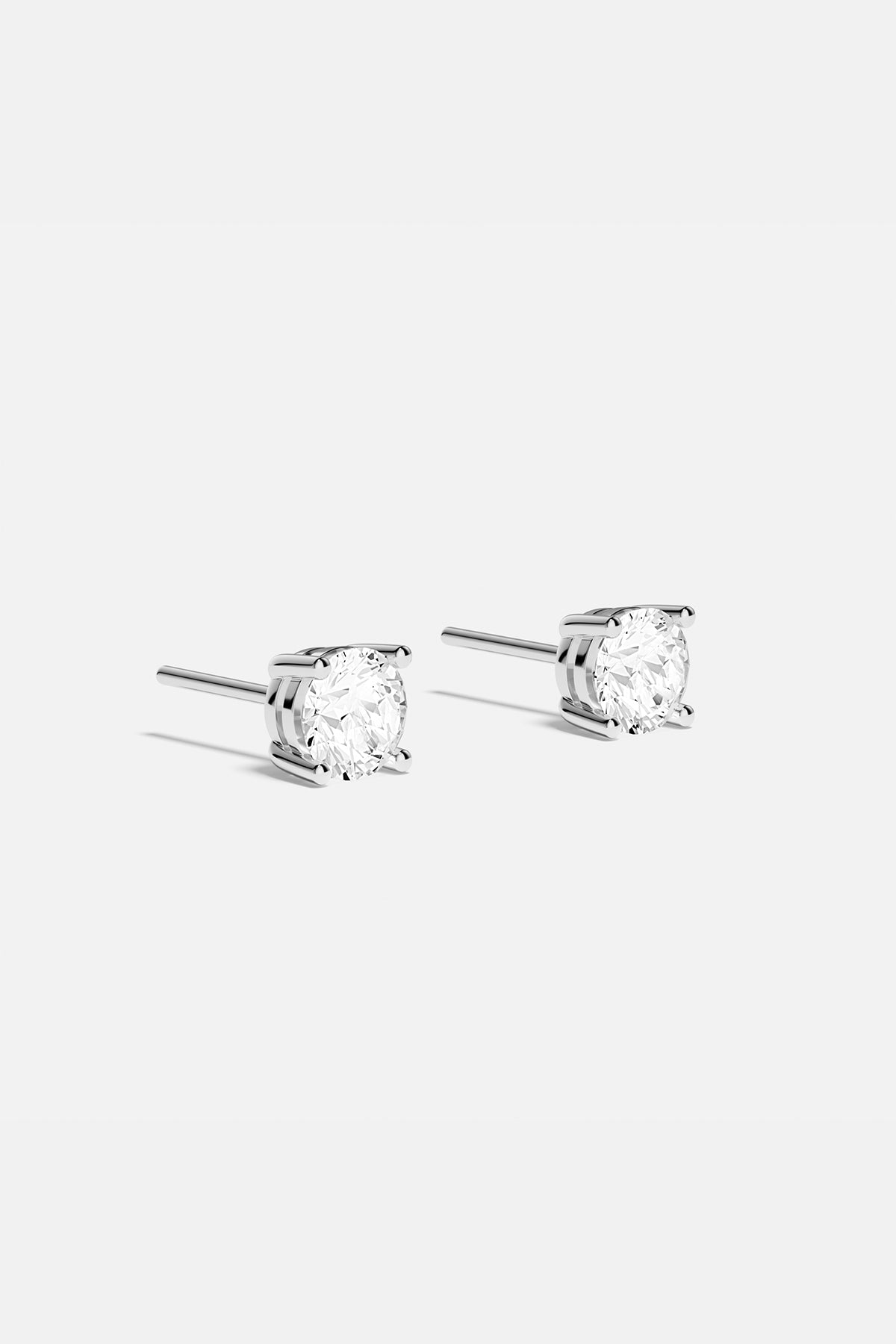 APM Monaco Lumière Tennis boucles d'oreilles puces blanc solitaire